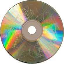 A scratched CD on a white background.